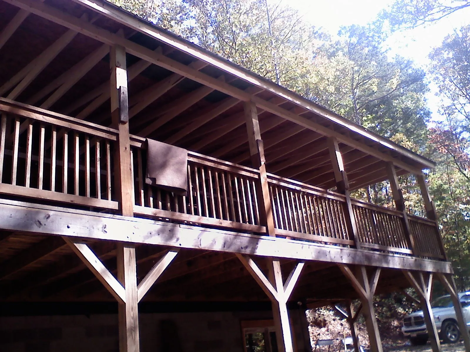 Timber framing under a new elevated porch and deck — Roof Leak Repair in Pendergrass by Roofing Brothers